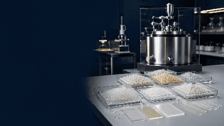 Host polymer pellets, plaques and preparation equipment in an advanced materials laboratory